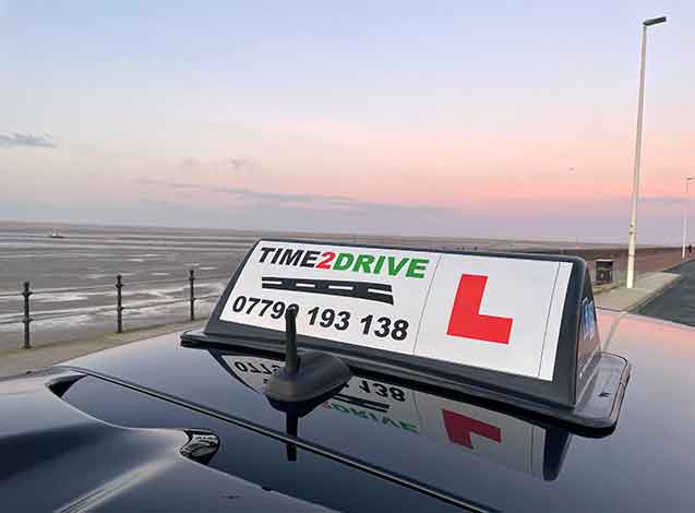 Time 2 Drive roof sign